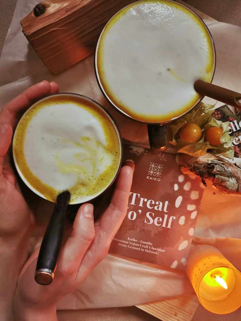 Two cups of hot chocolate with milk